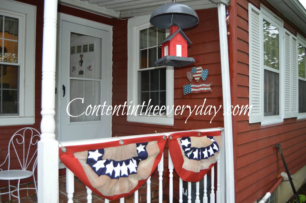 House decorated with patriotic bunting